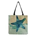 Detail view of a durable linen tote bag featuring a vibrant blue starfish pattern - Blue Starfish and Ocean Style Pattern (hm4538b)