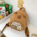 Cute brown plush capybara backpack featuring a transparent front pocket for small items - Winter Faux Rabbit Fur Style (with Badge Card) / 29cm x 25cm / Dark Brown