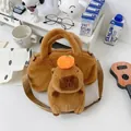 Cute brown Capybara plush shoulder bag featuring a cartoon capybara with orange topper - 3D Small Capybara