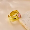 Detail of pink heart zircon on 18k gold plated hammered stainless steel open ring. - Pink Heart Zirconia Style