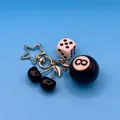 Stylish black cherry keychain featuring 8-ball and white dice charms on a star metal ring. - Black Cherry Dice