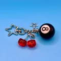Stylish red cherry and black 8-ball metal keychain pendant for bags and car keys - Red Cherry Star