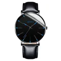 Close-up of Geneva minimalist men's watch with blue hands and black leather strap - Standard Size / Blue Hand Black Case Black Strap
