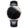 Detail of men's business watch with black dial and blue hands by Geneva brand - Standard Size / Blue Hands Rose Gold Case Black Leather Strap