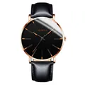 Close-up of a stylish Geneva men's business watch with a black dial and leather strap - Standard Size / Rose Gold Hands Rose Gold Case Black Leather Strap