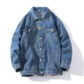 Loose fit men's denim jacket in classic washed blue with button chest pockets. - Blue
