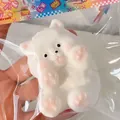 Adorable white bear squishy stress relief toy with pink paws in blind bag packaging - Ultra Soft Thickened High Quality / Cute Dog Squishy Butter Style