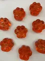 Translucent orange cat paw squeeze toy with gold foil glitter details - Cat Paw Style / Dazzling Red