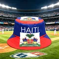 Red and blue bucket hat with Haiti flag emblem, displayed at a professional stadium. - 100% Cotton Double-sided Fisherman's Hat With White Base And Sea Hue / One Size Fits All (56-60)