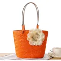 Handmade orange woven straw tote bag with large white flower accessory for summer beach - Orange Red