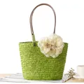 Fashionable green handwoven straw beach bag with a large white flower accessory - Green