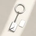 Silver metal envelope keychain pendant with an engravable blank tag for custom DIY gifts. - Steel Color Smooth Envelope