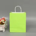 Sacchetto regalo ecologico in carta kraft verde lime con manici in corda bianca per lo shopping - Verticale n. 4 (13x21x8cm) / verde chiaro