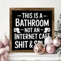 Detailed view of a rustic wooden frame featuring a humorous bathroom sign quote - Humorous Bathroom Slogan (26) / 20*20*0.6CM