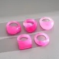 Detail shot of five vibrant pink resin rings in various geometric and square shapes - 5 Pieces / Pink