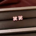 Close-up of pink zircon flower earrings in a velvet jewelry box with golden details. - Earrings / Silver Needle / Rose Gold-Pink