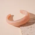 Macro view of peach marbled resin cuff bracelet with unique irregular thick band - 21# Bangle-Pink