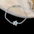 Vue détaillée du bracelet tennis en or 18 carats avec étoile en zircon et œil protecteur. - Style Étoile Mauvais Œil (HB5292) / Argent