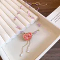 Preserved pink rose necklace with purple beads and drop pearls - Necklace / Gold-Purple-Pink