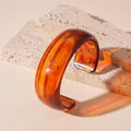 Retro amber tortoiseshell resin wide bangle with irregular minimalist design - Amber