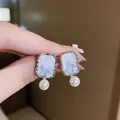 Detail showing crushed ice texture and pearl dangle of Korean style zircon earrings - 6# Silver Needle - Silver - Blue