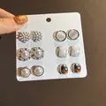 Detail view of 6-pair elegant earring set with pearls and silver-tone geometric studs - 10 Pieces Set / Silver-White