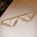 Detailed close-up of a retro gold metal glasses frame featuring elegant hanging rhinestones - Inverted Triangle Square Stone Style
