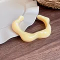 Chunky irregular resin bangle in creamy yellow Maillard retro style fashion accessory - Yellow