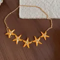 Vintage ethnic style gold waist chain with five orange starfish pendants for dress decoration - Style 41