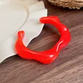 Vibrant red irregular wavy resin cuff bracelet featuring a bold vintage minimalist design - Orange Red