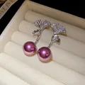Detailed view of elegant silver ginkgo leaf earrings with zircons and purple pearls - Silver Ginkgo Leaf Purple Pearl / Silver Earring Post Real Gold Plated