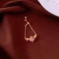Close-up of elegant gold chain ring featuring a radiant pink rhombic zircon stone - Chain Ring / Pink