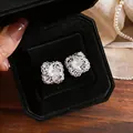 Intricate silver hollow flower zircon stud earrings in luxury black velvet gift box - Hollow Petal Rhombus Studs / Silver