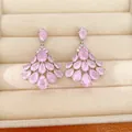 Close-up detail of 14k gold plated fan-shaped earrings with sparkling pink cubic zirconia - 14k Gold Plated Tassel Style (HE34194) / Gold (Pink Zirconia)