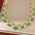 Elegant court-style necklace with green oval zircons and blue enamel detailing. - Necklace / Gold/Green