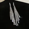 Elegant silver-tone long tassel earrings with sparkling zircons for a luxury look - Long Tassel Stud Earrings (HE32036) / Silver