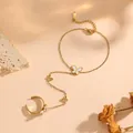Elegant gold butterfly slave bracelet with white shell motifs in stainless steel - White Shell Hollow Butterfly Hand Chain (O712) / Gold