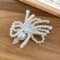 Macro detail of an elegant pearl flower hair clip with silver rhinestone accents - Duckbill Clip (Single Piece)