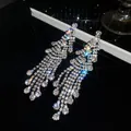 Close-up macro view of sparkling diamond long tassel earrings with vintage luxury design - Rhombus Hollow Long Tassel Style (7#)