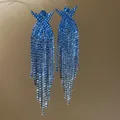 Macro view of glittering blue rhinestone tassels on elegant silver needle earrings - Crown Blue-Silver Gradient Tassel Style (23#)