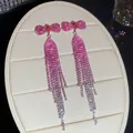 Elegant pink bow earrings with sparkling rhinestone long tassels in a silver needle finish - Bowknot Pink Gradient Tassel Style (43#)