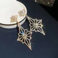 Elegant geometric dangle earrings with shimmering rhinestones in retro gold finish - Geometric Rhombus Starburst Style (61#)