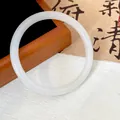 Close-up of a elegant white imitation jade glass bangle on a decorative background - Beige (Style 12)