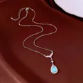 Élégant collier argenté avec pendentif queue de poisson et pierre goutte bleue - Pendentif Goutte d'Eau Queue de Poisson / Bleu