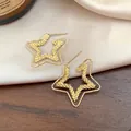 Eleganti orecchini a lobo a stella dorata scintillante da donna, design coreano chic - Stella / Oro