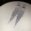 Elegant silver tone long tassel drop earrings with sparkling rhinestones for women - Swan Shape Tassel Style (85#)