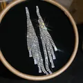 Sparkling silver-tone rhinestone multi-strand tassel earrings for luxury evening wear - Waterfall Tassel Baguette Rhinestone Style (66#)