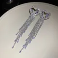 Elegant silver needle heart-shaped long tassel earrings decorated with sparkling rhinestones - Heart Hollow Rhinestone Tassel Style (86#)