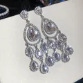 Luxurious silver-tone chandelier earrings with pear-cut crystals and fringe drops. - Pear-Shaped Drop Tassel Style (70#)