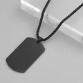 Close-up of a minimalist black stainless steel dog tag pendant necklace with a box chain - Long Chain / Black